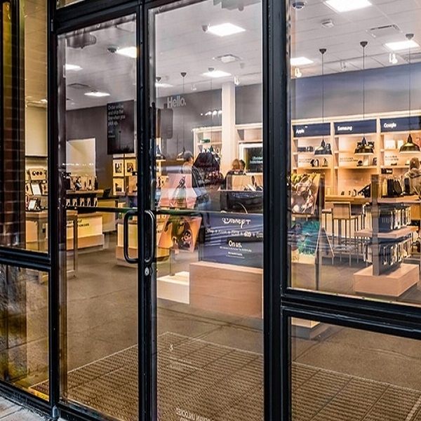 Commercial storefront with impact-resistant glass for hurricane window protection.